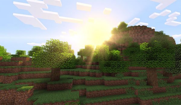 image where we see the sun rise over a mountain that cast shadows on the floor, with the shaders mod.